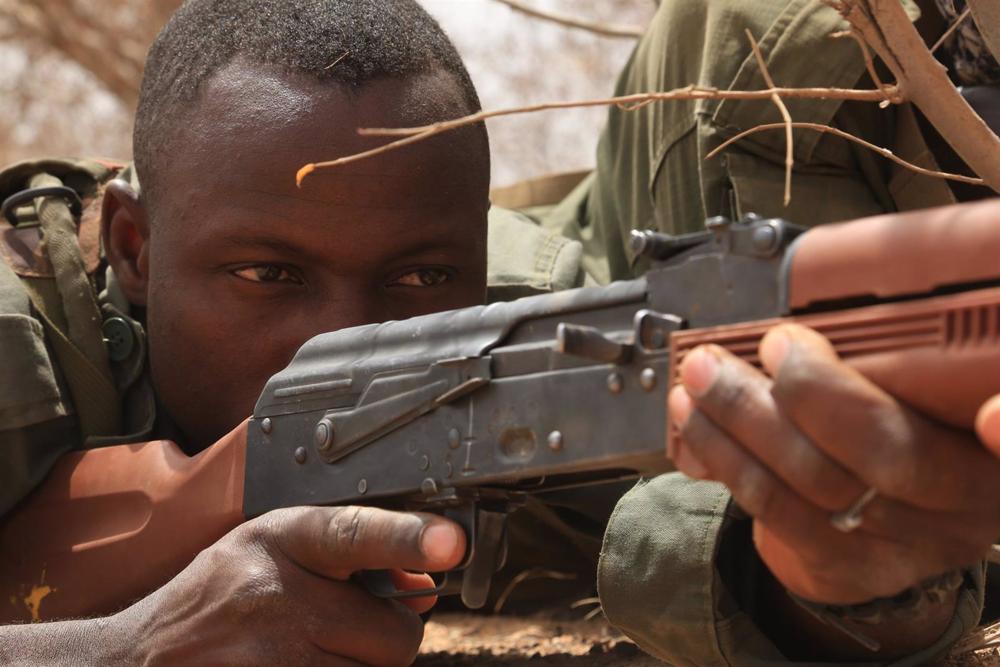 File - File image of a military man in Burkina Faso. File