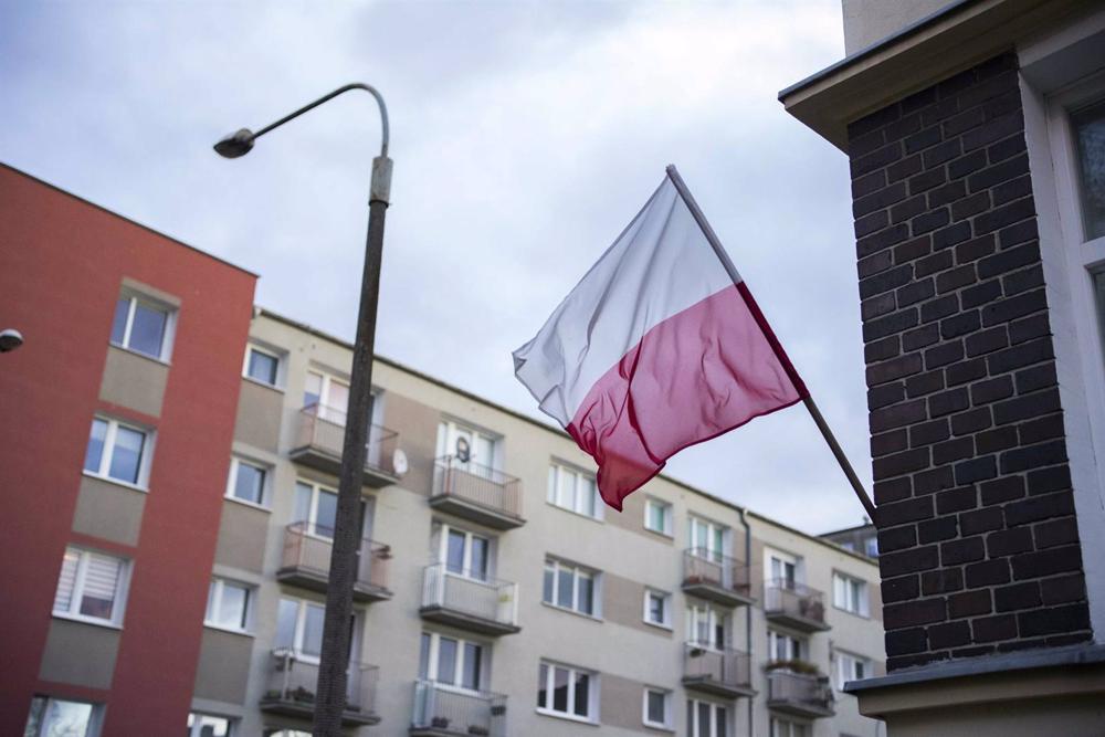 Archive - Polish flag on a Poznan building Archive