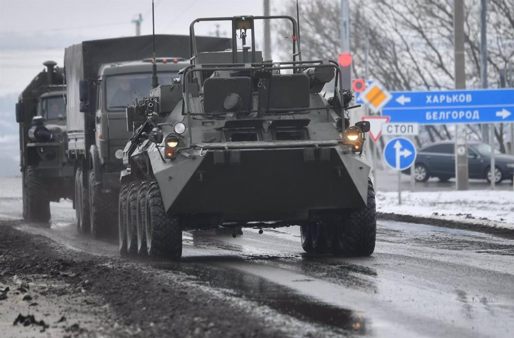File - File image of an armored vehicle moving along a road near the Ukrainian border in the Belgorod region, Russia. File