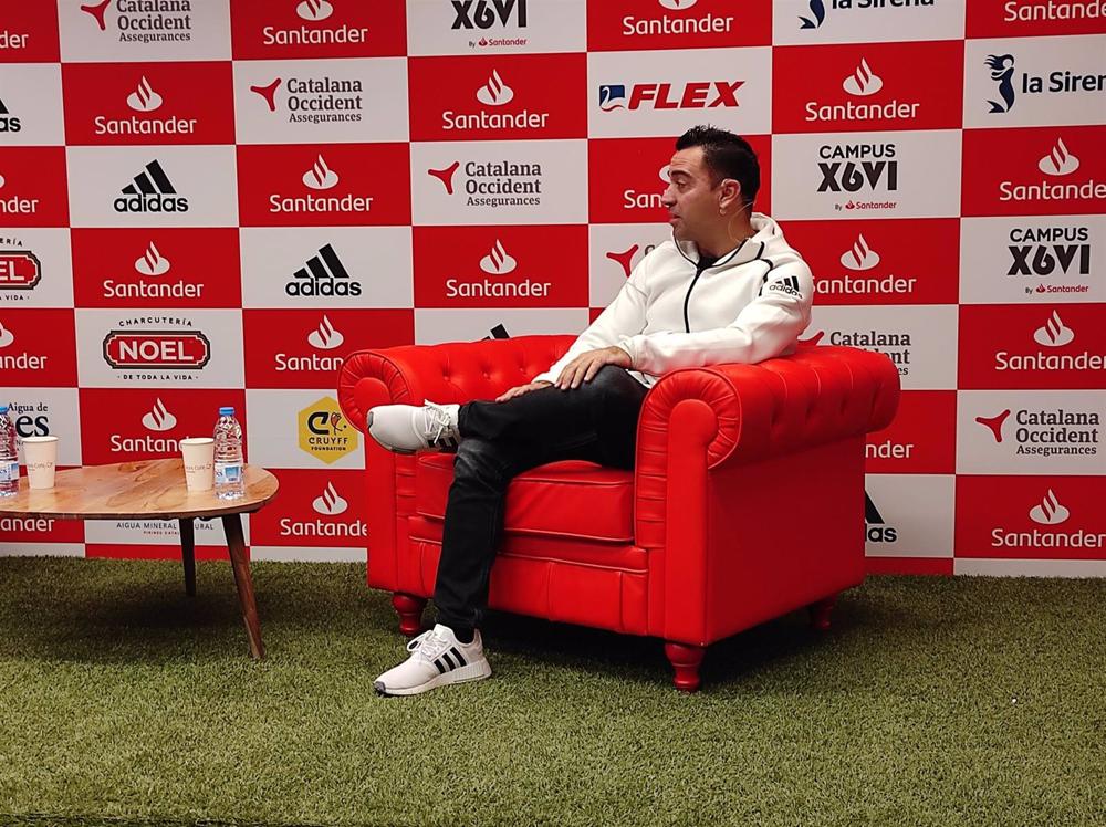El entrenador del FC Barcelona, Xavi Hernández, en un acto de su Campus Xavi by Santander, en el Santander Work Café de Passeig de Gràcia (Barcelona) El