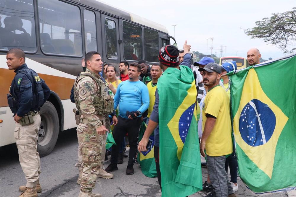 Supporters of Jair Bolsonaro block a highway in Rio de Janeiro to protest Luiz Inácio Lula da Silva's election victory Supporters