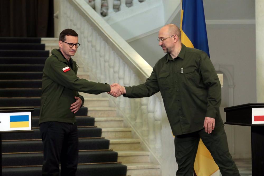 File - Polish Prime Minister Mateusz Morawiecki greets his Ukrainian counterpart Denis Shmigal in Kiev. File