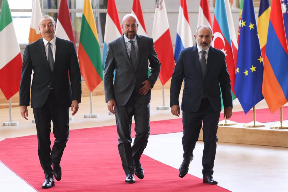 Archive - European Council President Charles Michel welcomes Azerbaijan's President Ilham Aliyev (left) and Armenia's Prime Minister Nikol Pashinian at the EU headquarters in Brussels. Archive