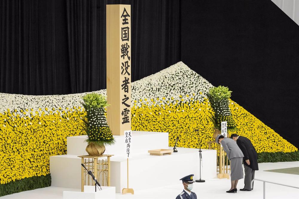 File - Japan's Emperor Naruhito and Empress Masaho participate in the commemoration of the 77th anniversary of Japan's surrender in World War II, following the atomic bomb attacks on Hiroshima and Nagasaki. File