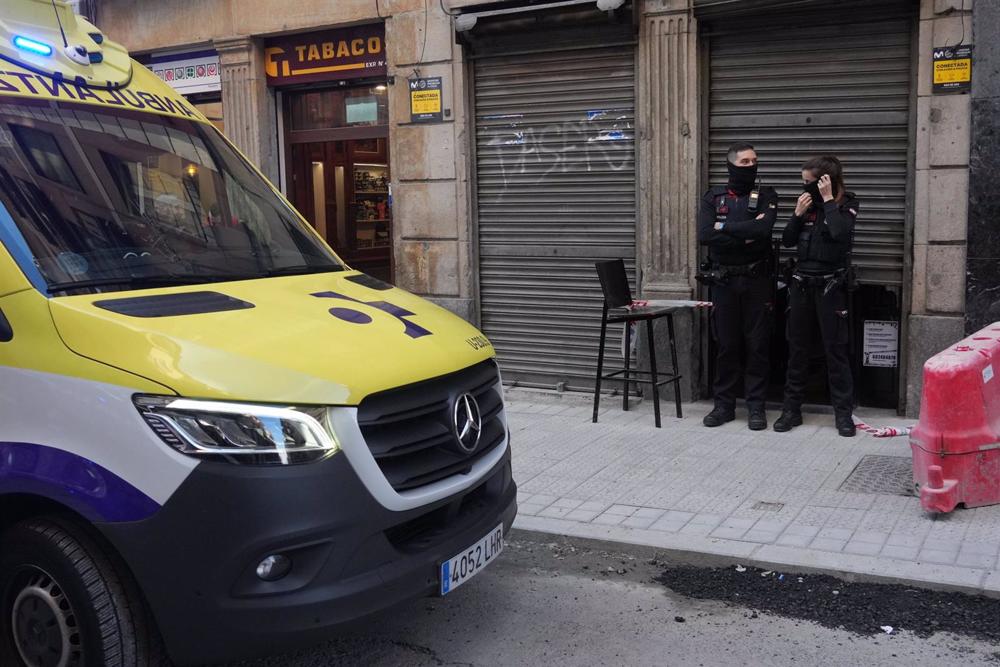 Two Ertzaintza police officers at the door of the Hiargi tavern, where the incident took place, in San Francisco street in Bilbao, on December 28, 2022, in Bilbao, Vizcaya, Euskadi (Spain). Two