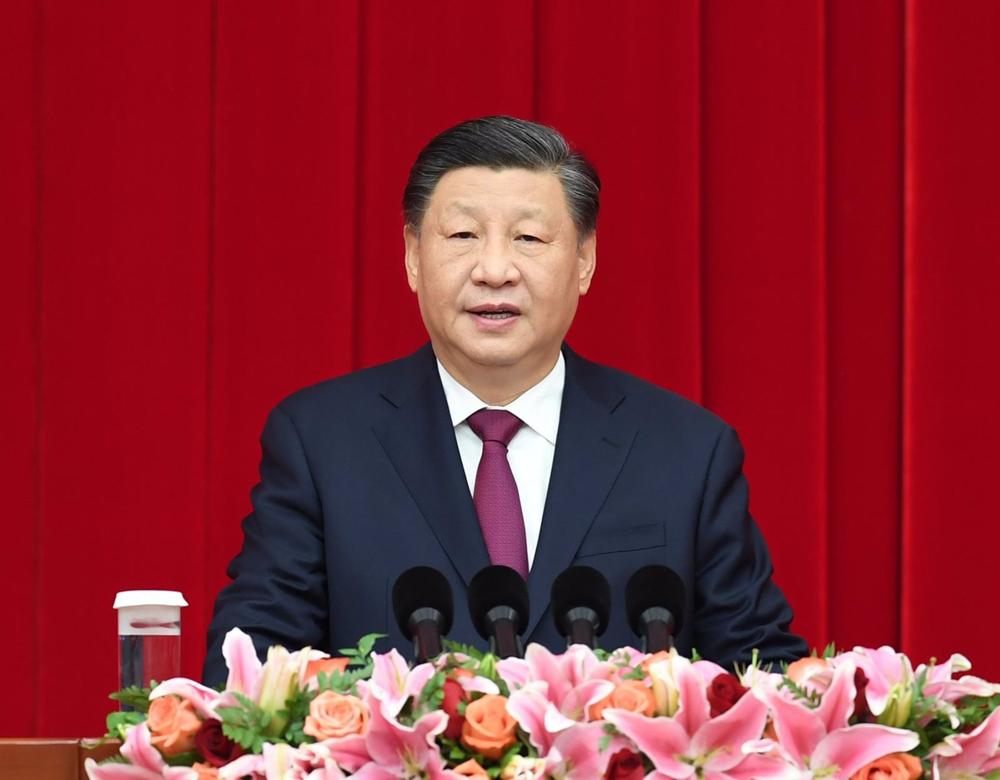 Xi