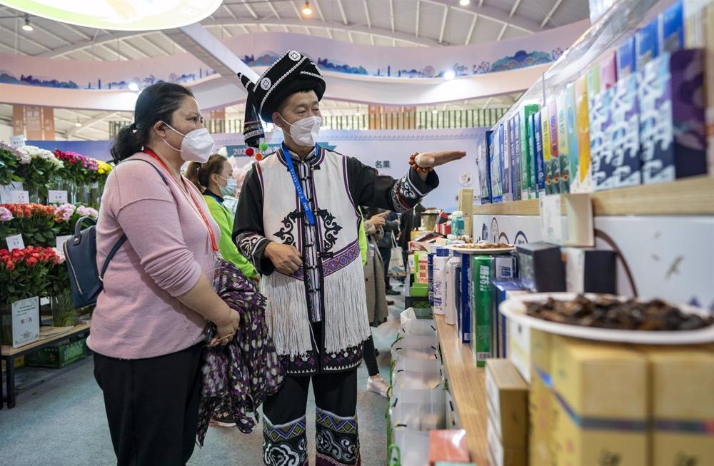 Archive - People wearing masks at a fair in Kunming, Yunnan, China. Archive