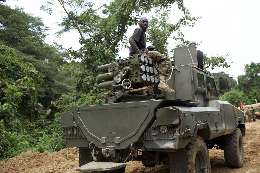 File - Soldiers in a military vehicle during a joint operation of the armies of the Democratic Republic of Congo (DRC) and Uganda in Beni, eastern DRC. File