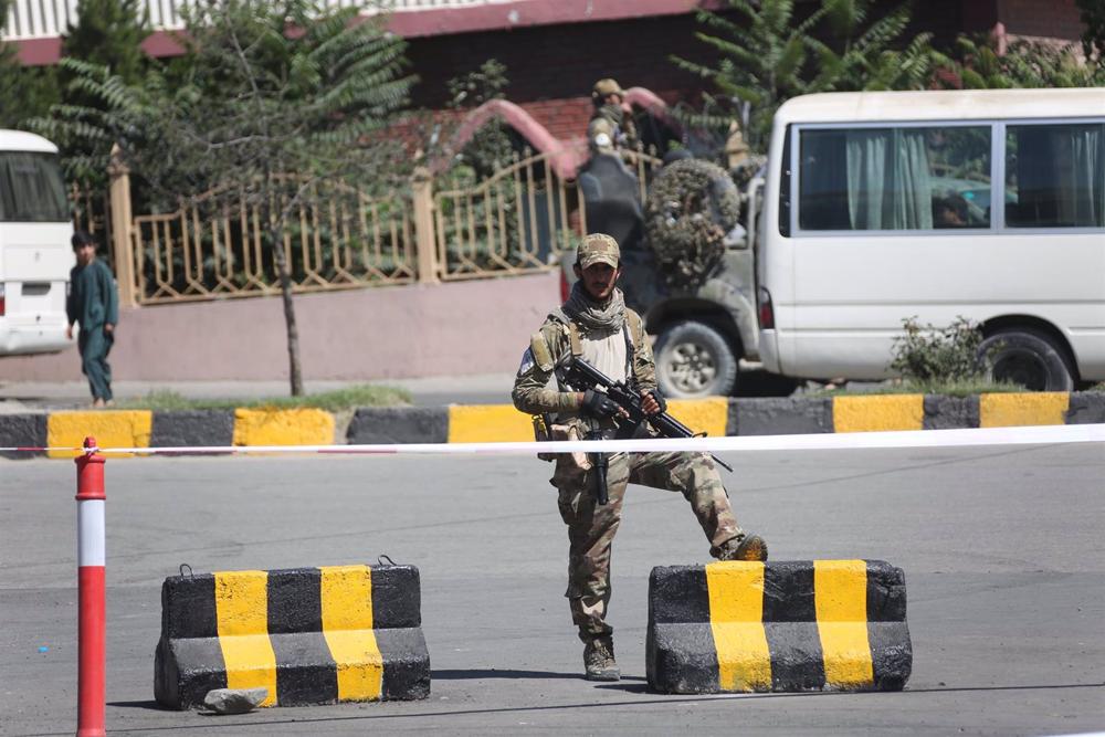 File - A Taliban man at a checkpoint in Kabul. File