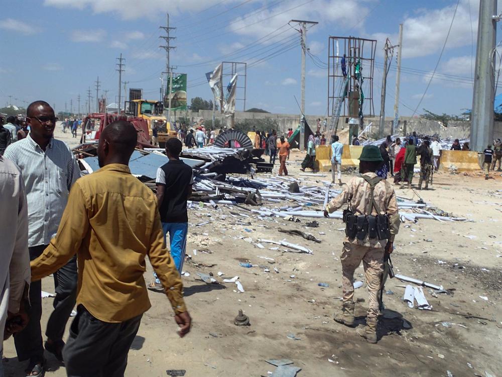 File - Civilians and members of the Somali forces after an Al Shabaab attack in Mogadishu. File