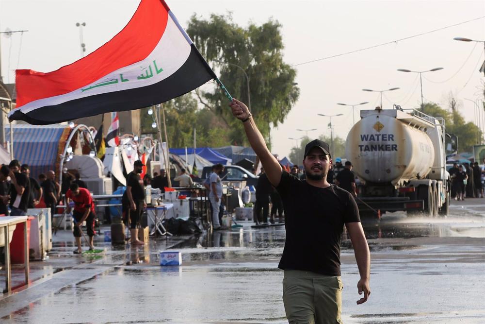 Demonstrators take to the streets in Iraq to protest devaluation of Iraqi dinar against the dollar
