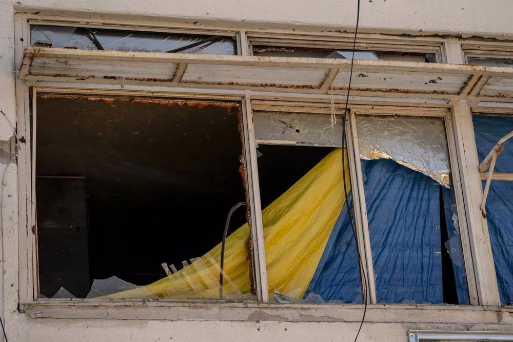 Archive - Ukrainian flag inside a destroyed building in Kharkov. Archive