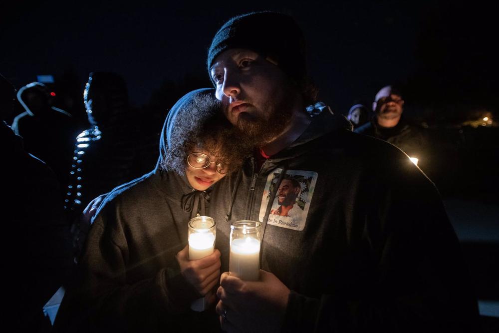Attendees at a candlelight vigil for Tyre Nichols. Attendees