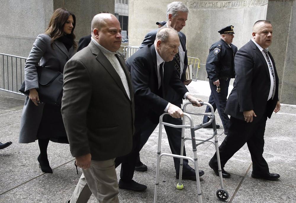 File - : U.S. producer Harvey Weinstein arrives in court to begin the trial in which he is accused of rape and sexual assault. File