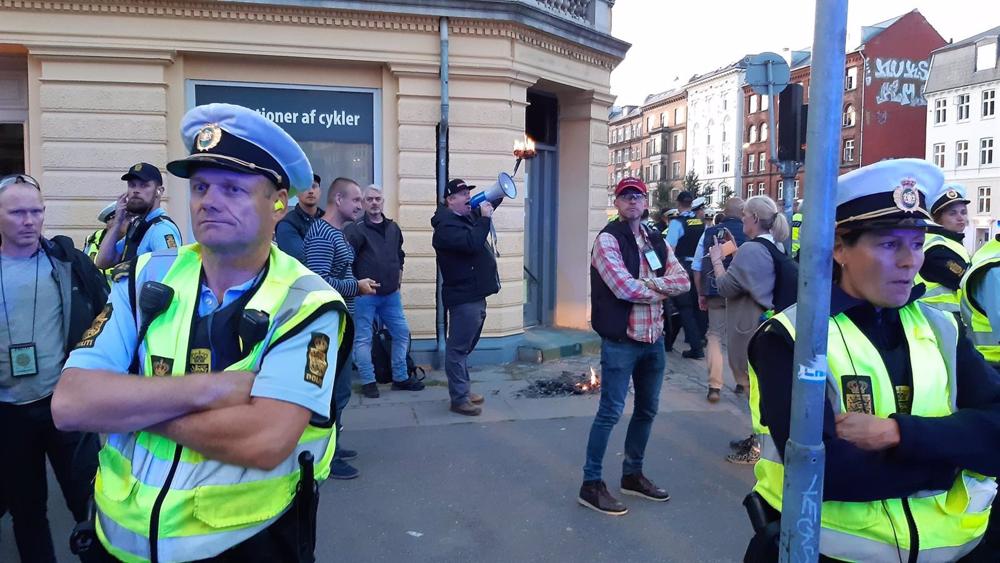File - Danish far-right extremist Rasmus Paludan burning a copy of the Quran on Sept. 2, 2019. File