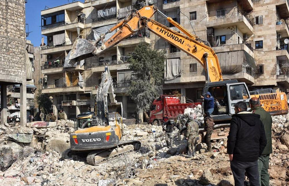Search and rescue work in the Syrian city of Aleppo following earthquakes in southern Turkey near the Syrian border. Search