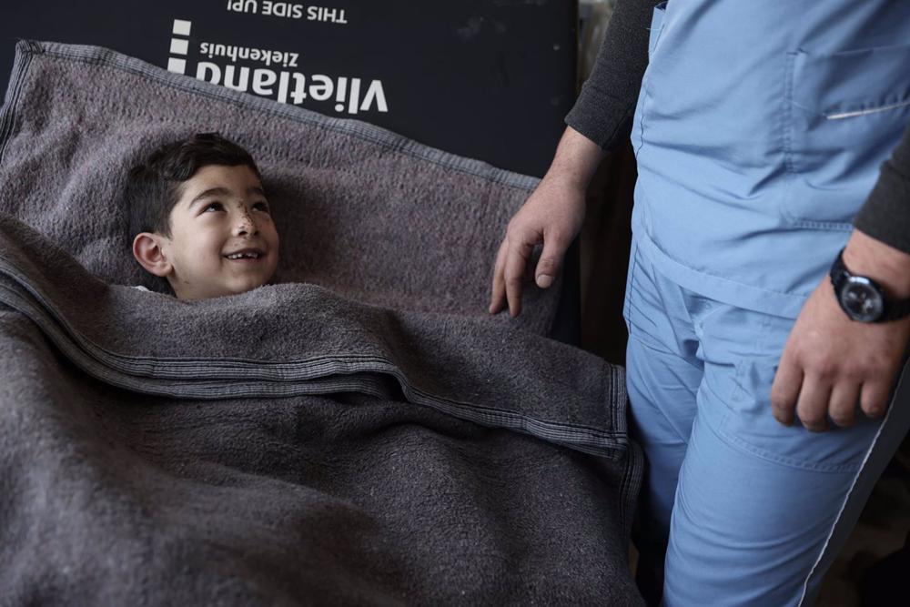 Image of a child rescued from the earthquake in Syria. Image