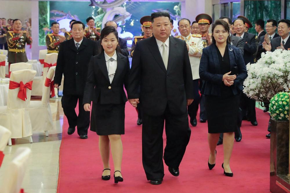 North Korean leader Kim Jong Un with his wife and daughter. North