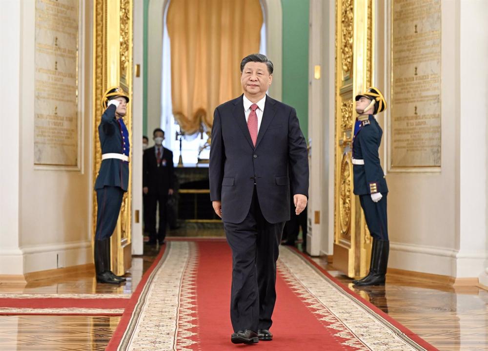 Xi