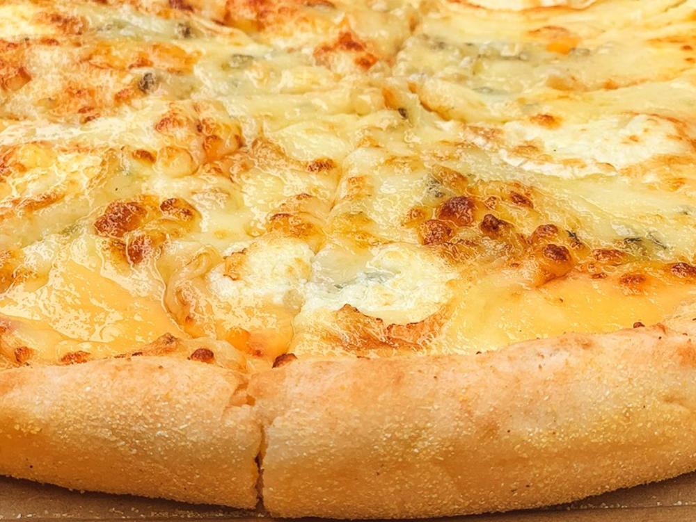 Las pizzas de Domino's Pizza están elaboradas con queso 100% mozzarela Las
