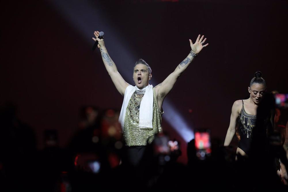 El cantante Robbie Williams en su primer concierto en Barcelona dentro de su gira por su 25 aniversario en los escenarios como solista El