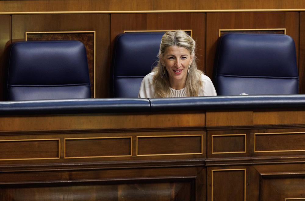La vicepresidenta segunda y ministra de Trabajo y Economía Social, Yolanda Díaz, durante una sesión plenaria en el Congreso de los Diputados, a 30 de marzo de 2023, en Madrid (España). La