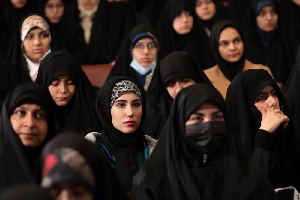 File - Students attend a lecture by Iranian President Ebrahim Raisi at Tehran University. File