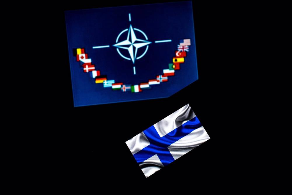 Archivo - Composición con la bandera de Finlandia y otros países miembro de la OTAN Archivo