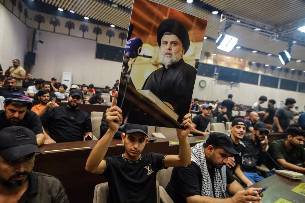Iraqi cleric Muqtada Al Sadr suspends his movement’s political activities for a year